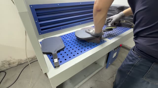 Surface finishing on a pickleball paddle