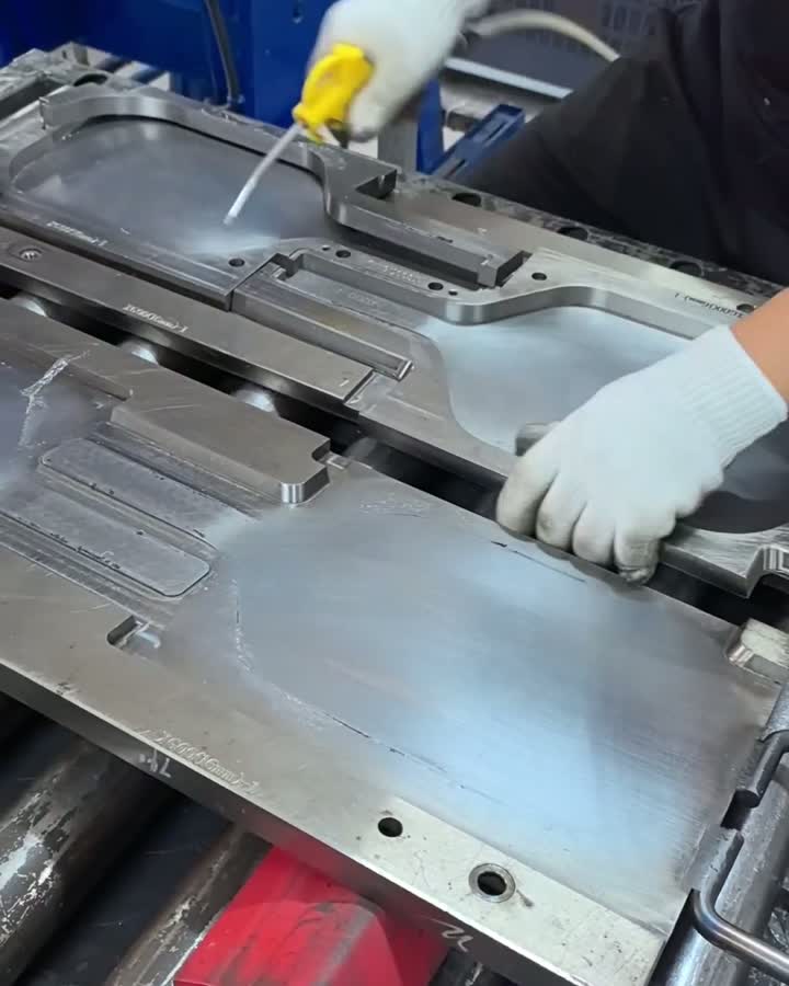 Close cropped view of paddle assembly in a metal mold